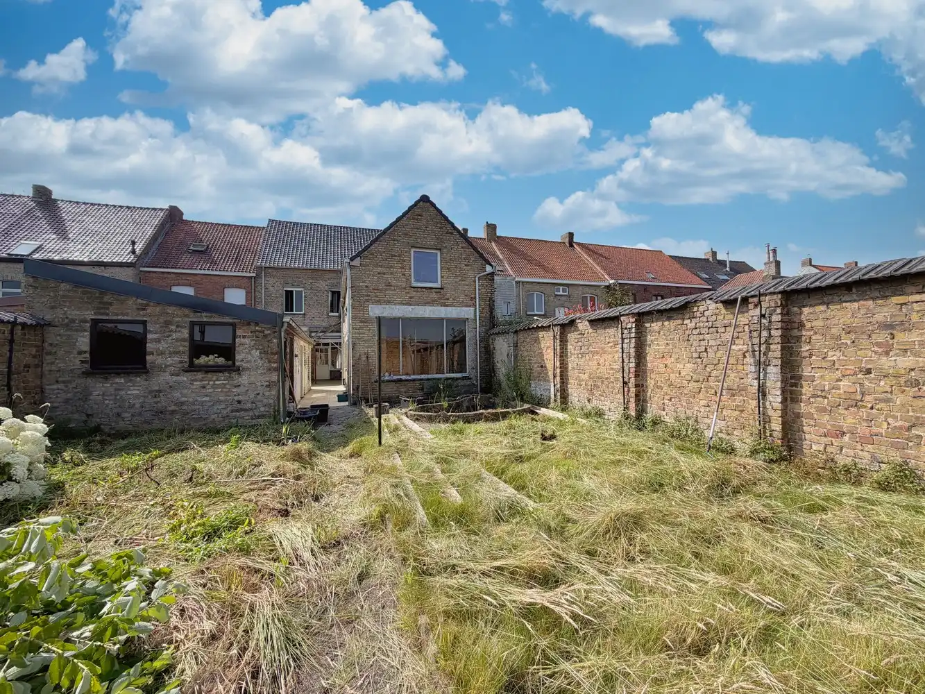 Ruime woning met polyvalente ruimte, zonnige tuin en tal van mogelijkheden foto 16