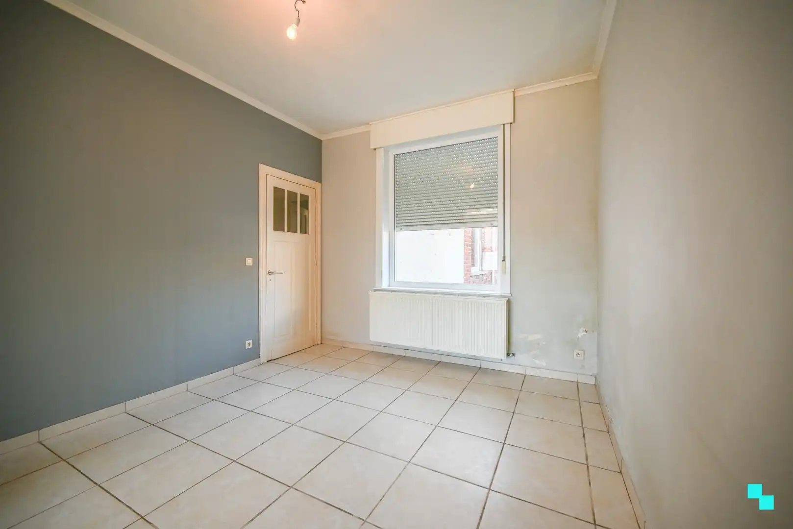 Op te frissen eengezinswoning met uitweg achteraan foto 5