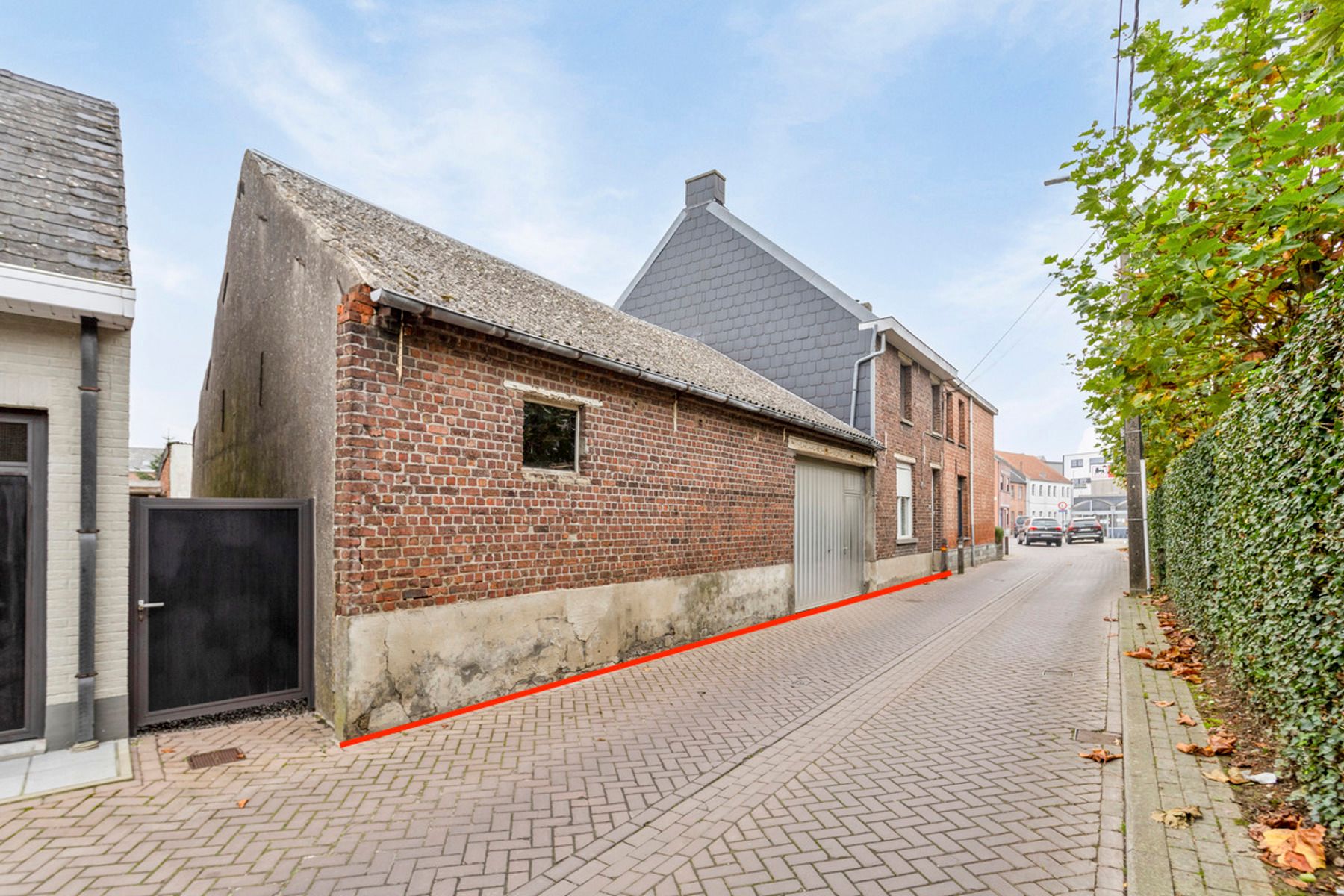 Te renoveren woning met loods in centrum Buggenhout foto 2