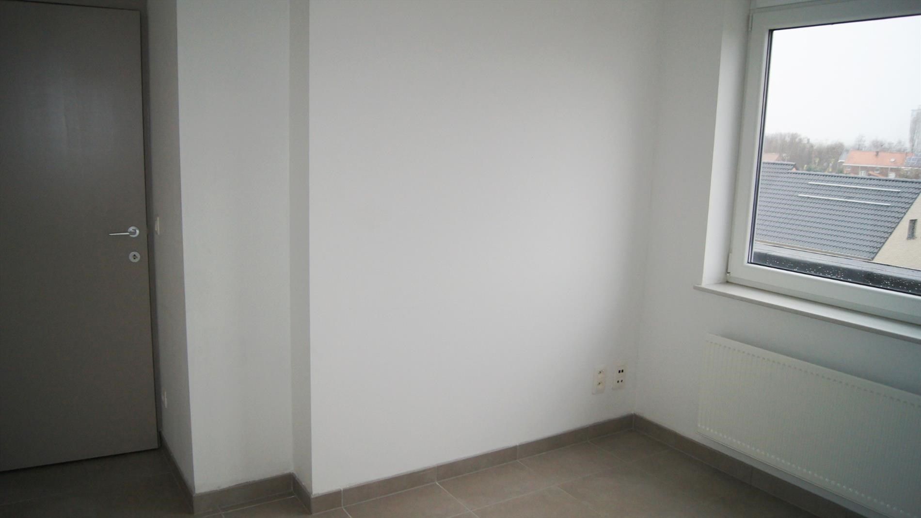 App. met 1 slpk, groot terras en garage foto 9