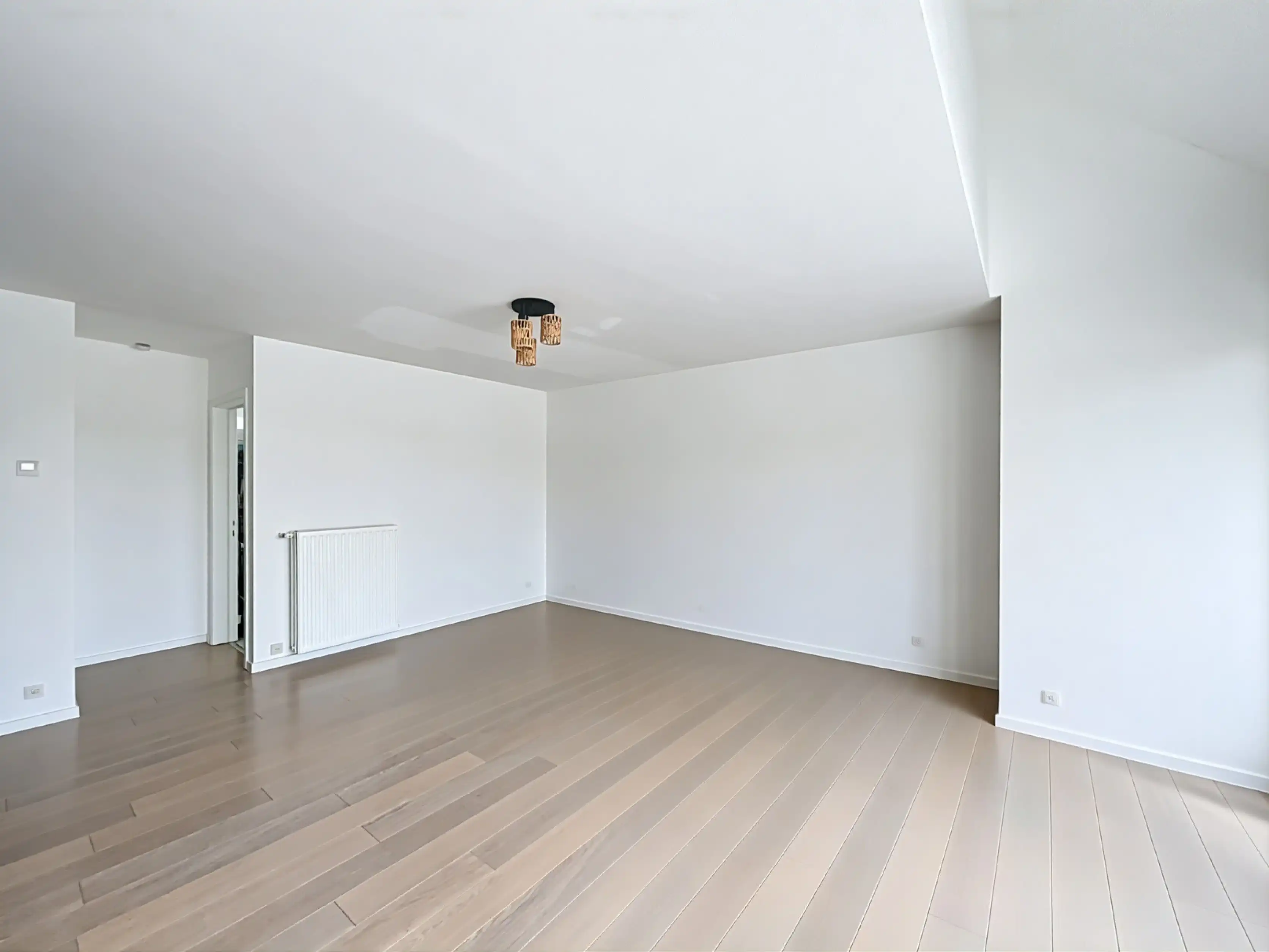 Buitengewoon ruim appartement met open zicht, parking inhuis en multifunctionele zolderruimte foto 3