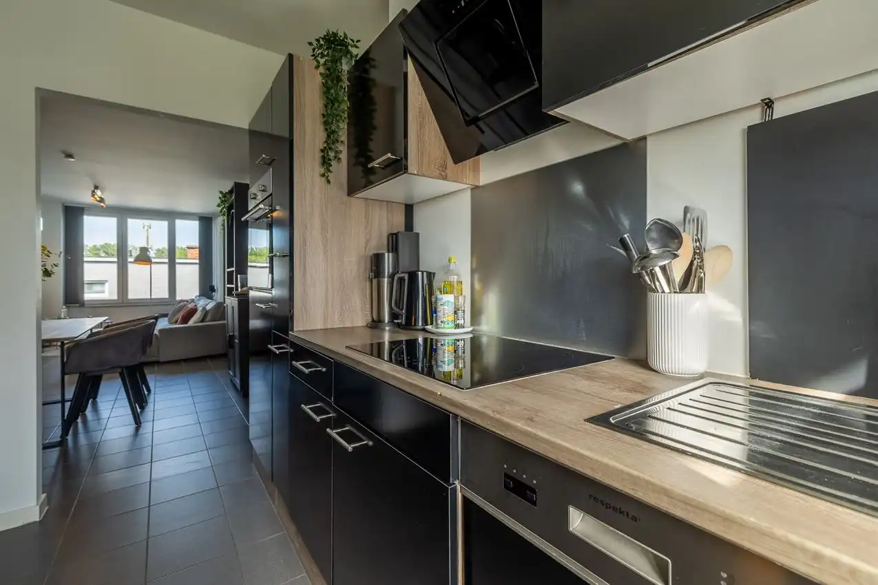 Gunstig gelegen woning, gelijkvloers, 2 slpk, omheinde tuin, garage foto 15