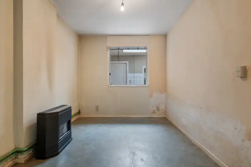 Te renoveren starterswoning met 2/3 slaapkamers en tuinjte foto 5