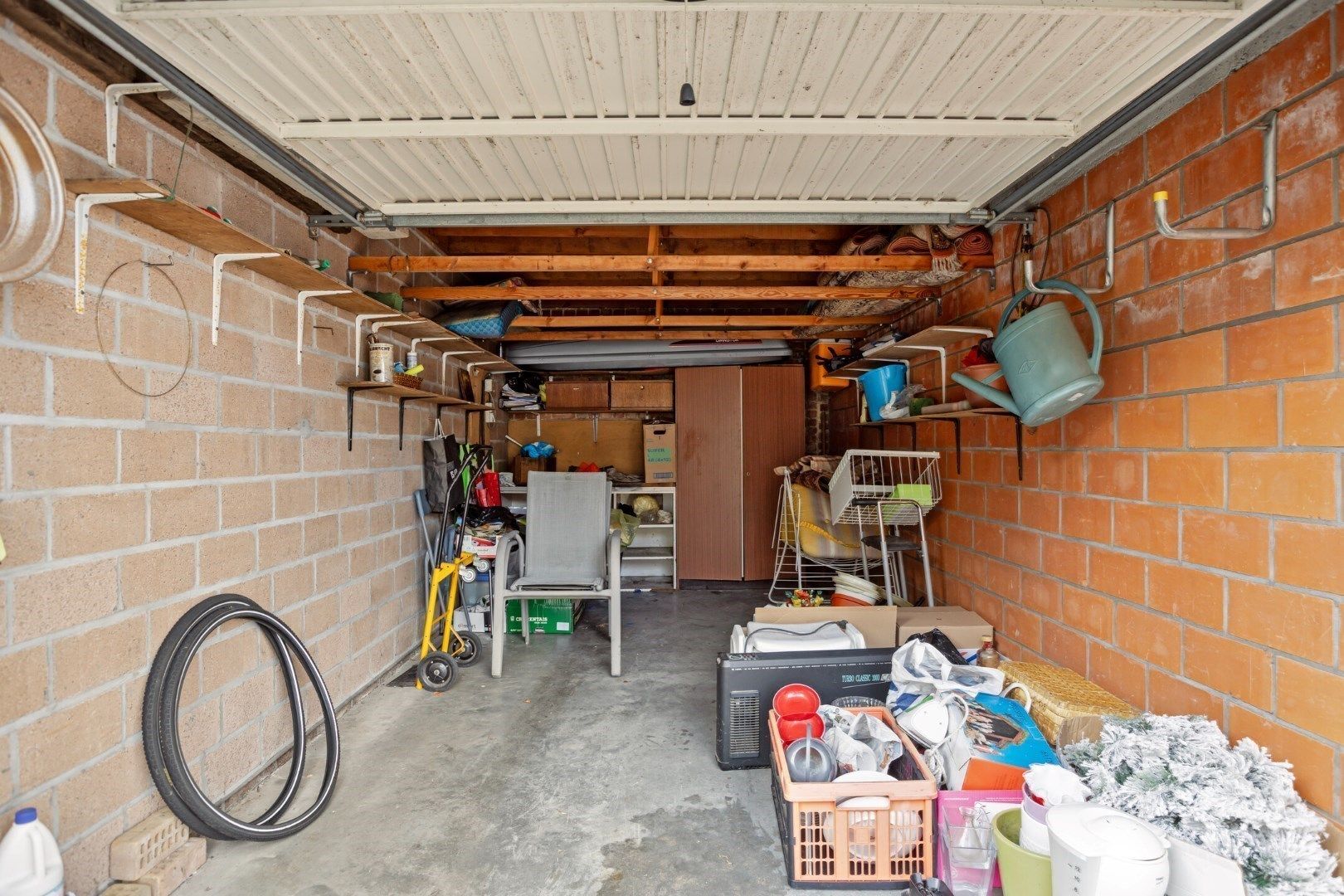 Heel aangenaam, lichtrijk gelijkvloers appartement met tuin én garage! foto 22