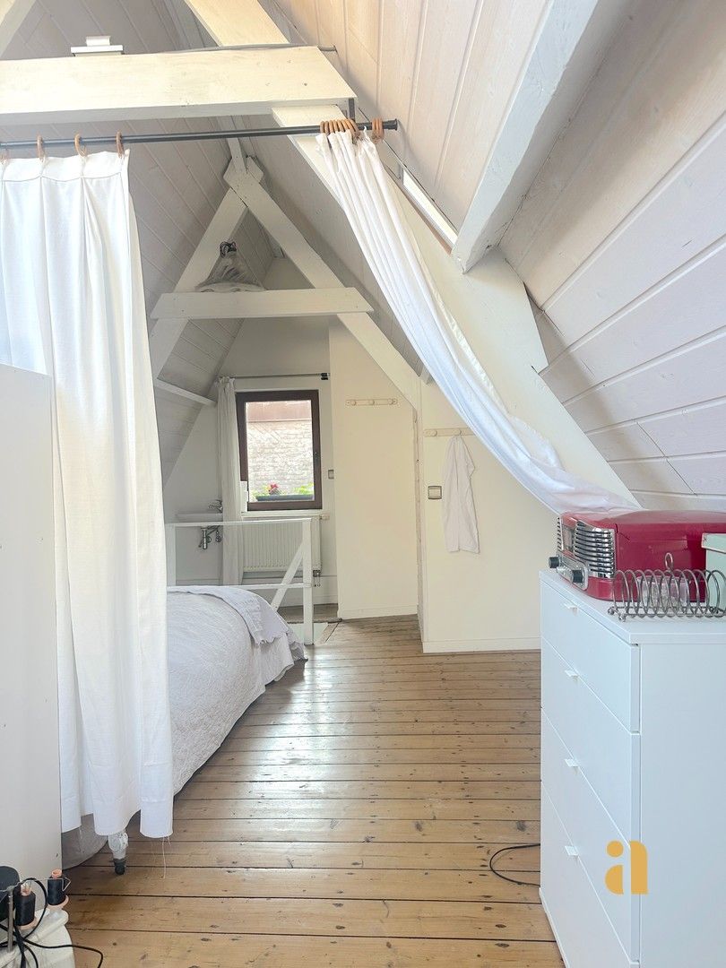 Uniek handelspand met woonst in de charmante Serpentstraat foto 24