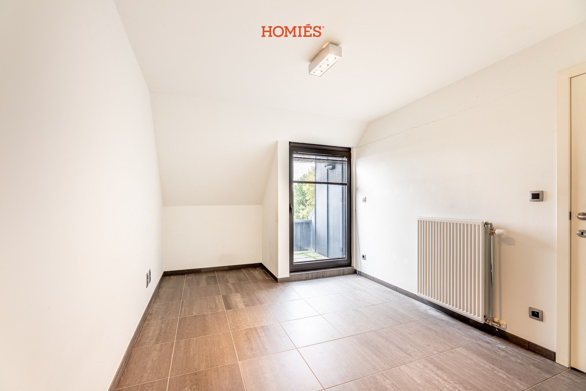 Ruim triplex appartement op strategische locatie foto 6