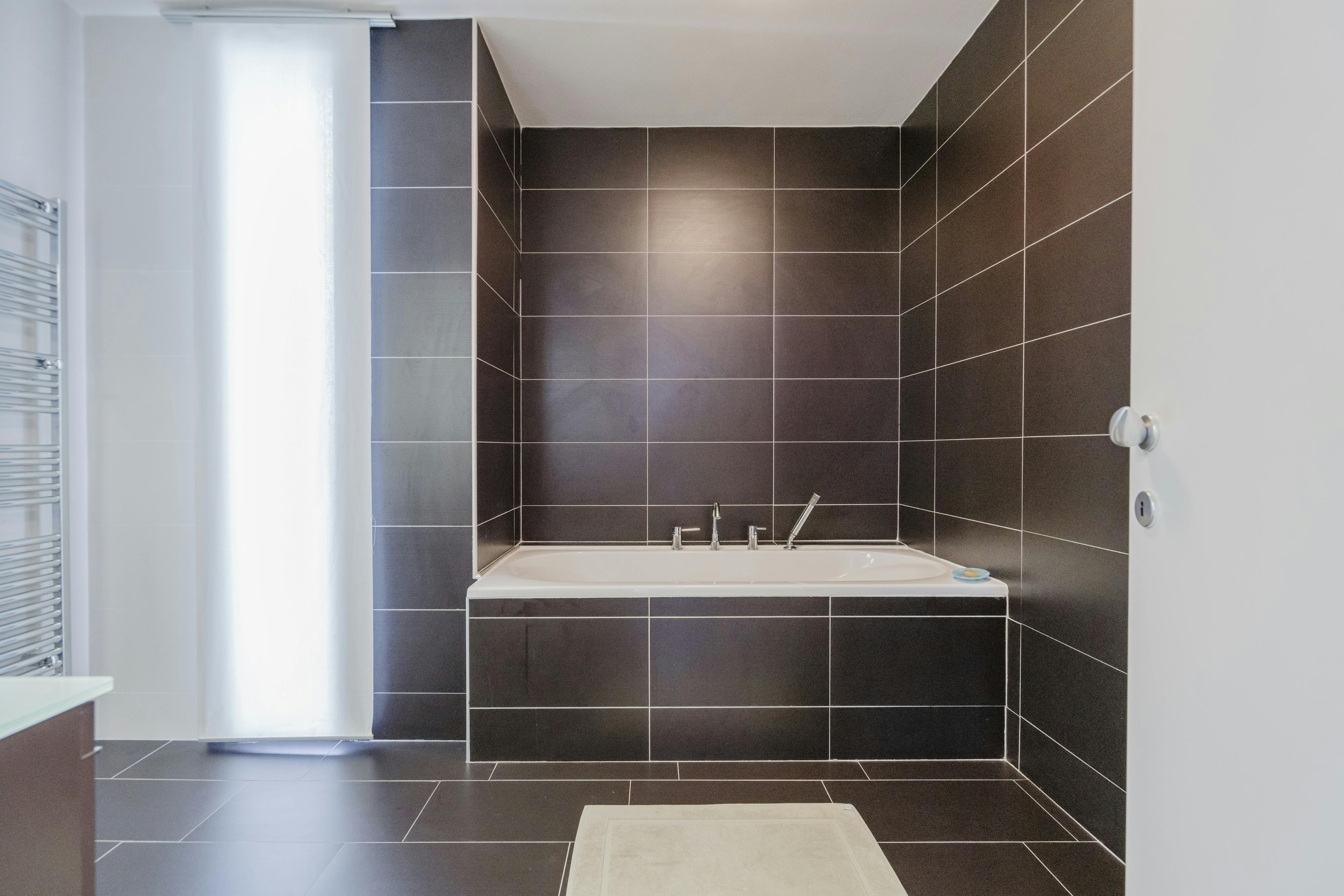 Architecturale patiowoning met tijdloze klasse foto 13