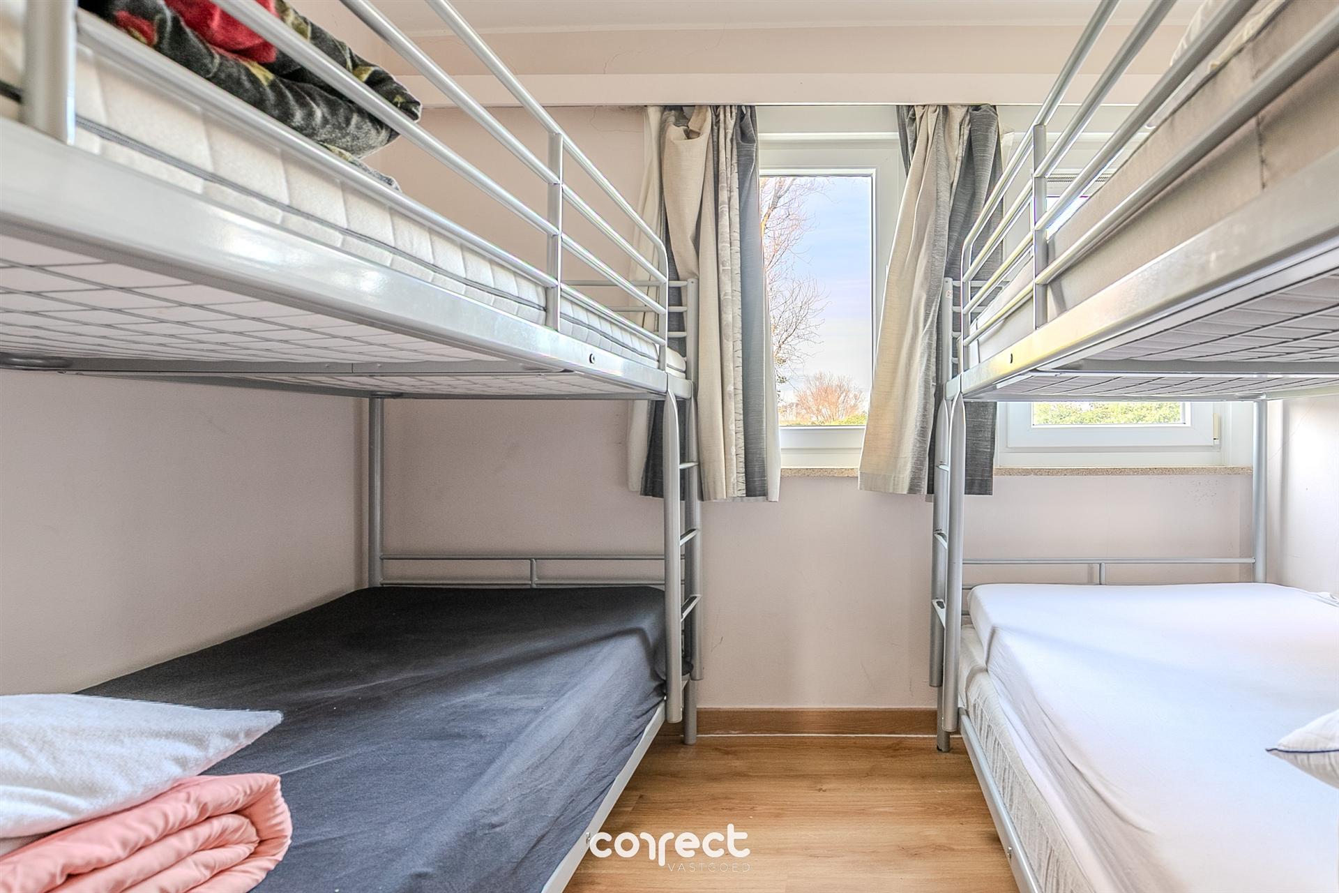 Gelijkvloers 2 slaapkamerappartement. foto 7