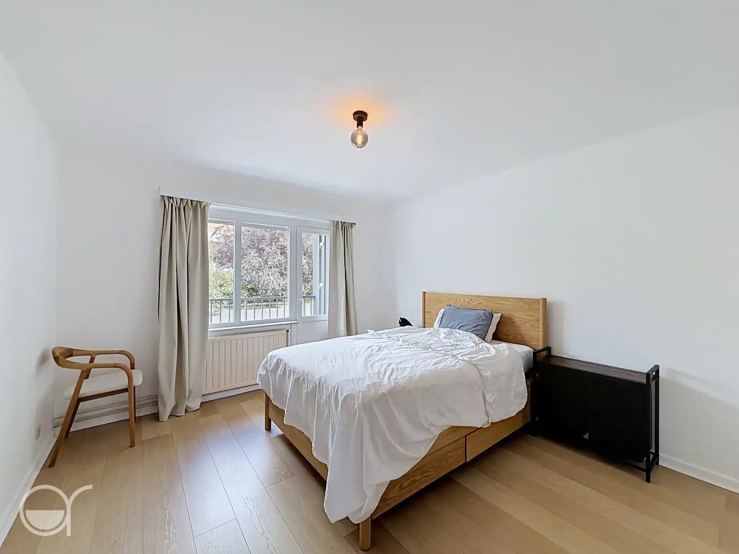 Ruim gezellig twee slaapkamer appartement met garagebox foto 9