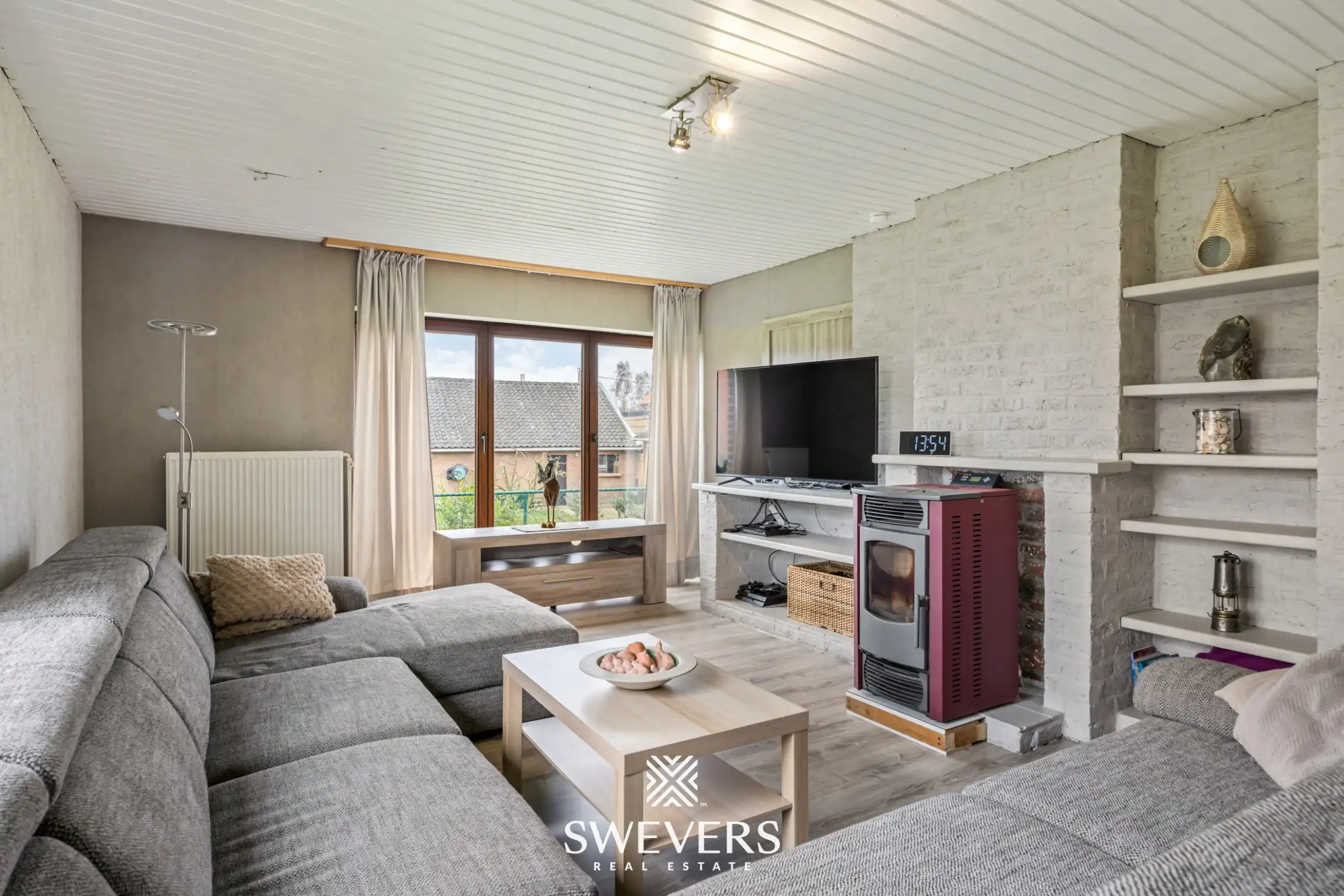 Zonnige woning met ruime zuid georiënteerde tuin in het rustige Diepenbeek foto 3