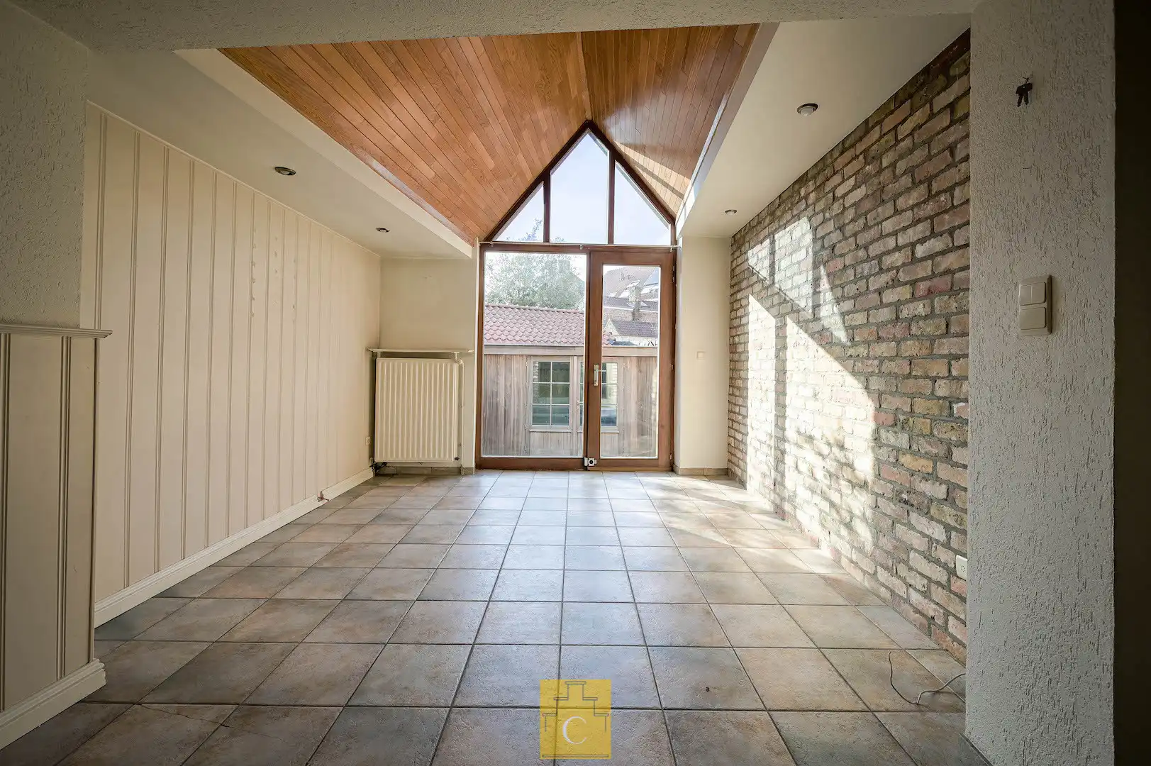 Instapklare trapgevelwoning met zonnig terrastuintje en grote berging, centrum, rustige straat omgeving ’t Zand foto 8