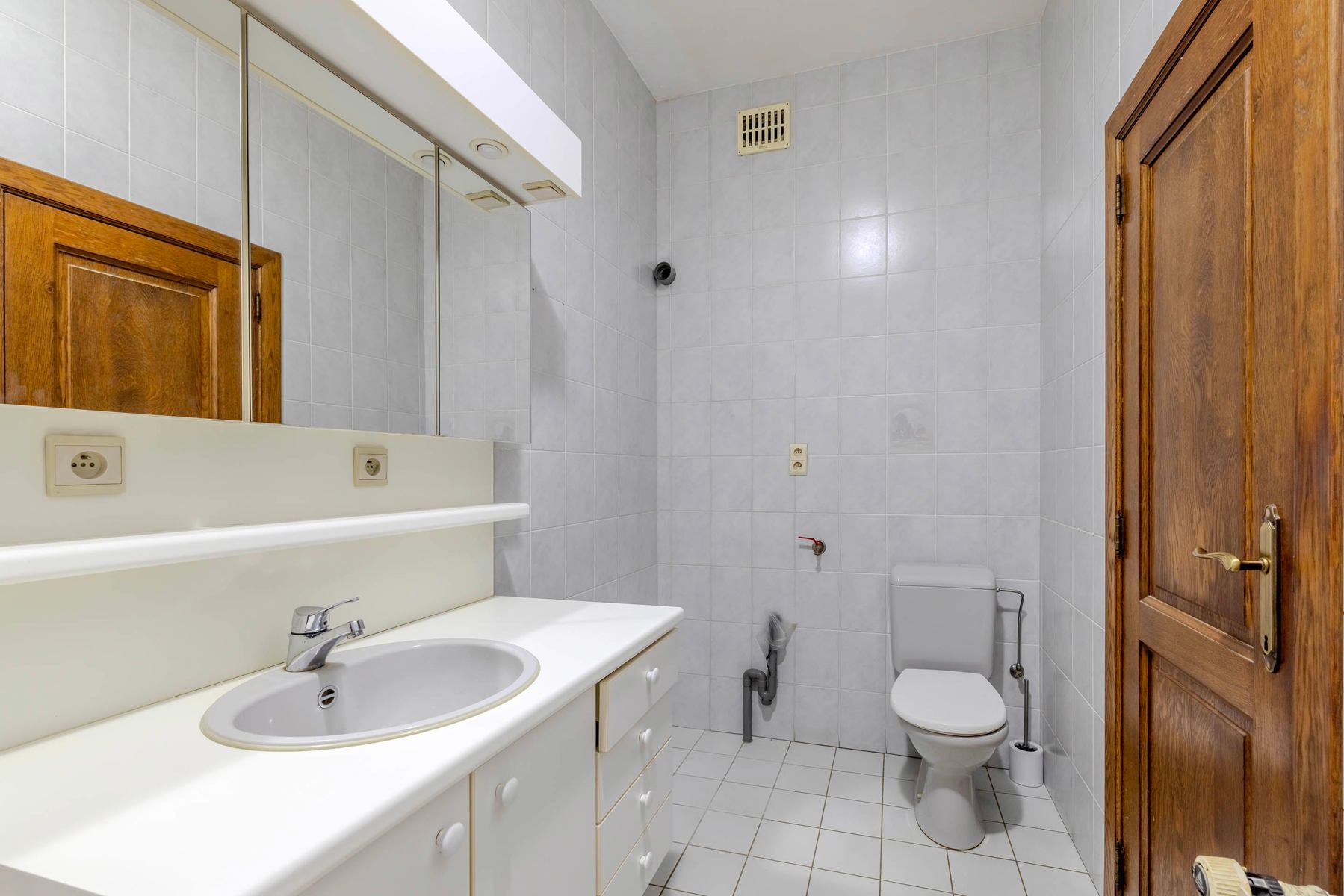 Gelijkvloers appartement met grote stadstuin foto 16