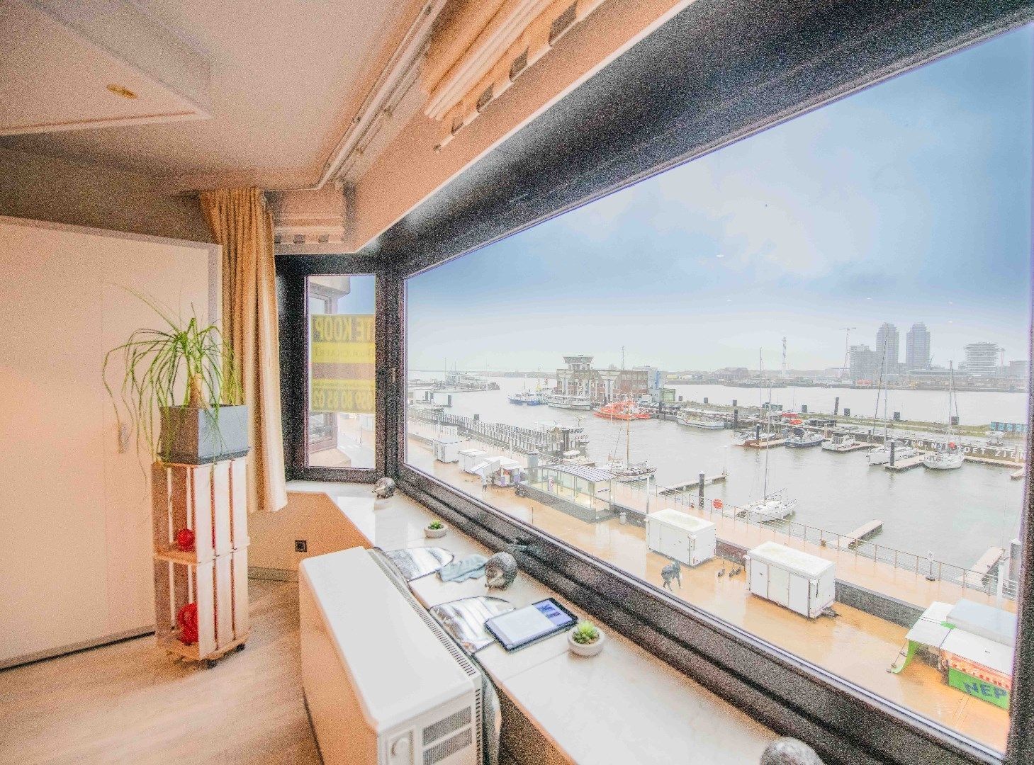 WOONAPPARTEMENT MET OPEN ZICHT NAAR DE HAVEN foto 1