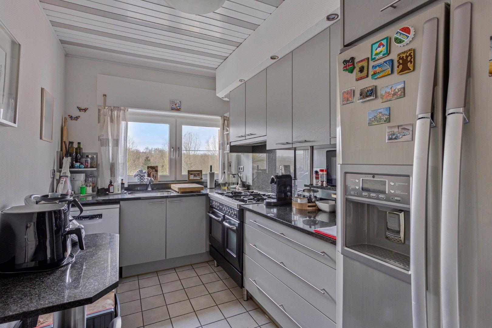 Ruime woning met karakter + appartement + werkplaats te Tongeren-Sluizen foto 6