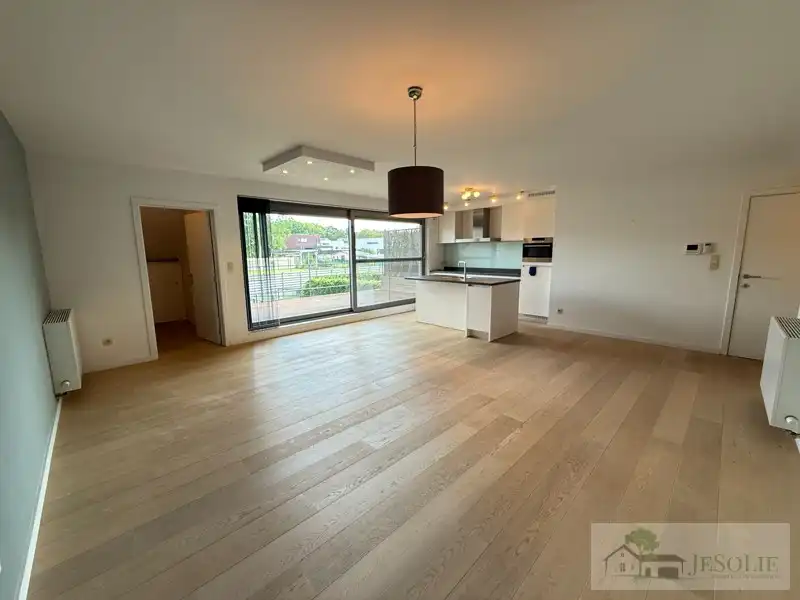 Tiptop verzorgd 2 slpk appartement met groot terras foto 3