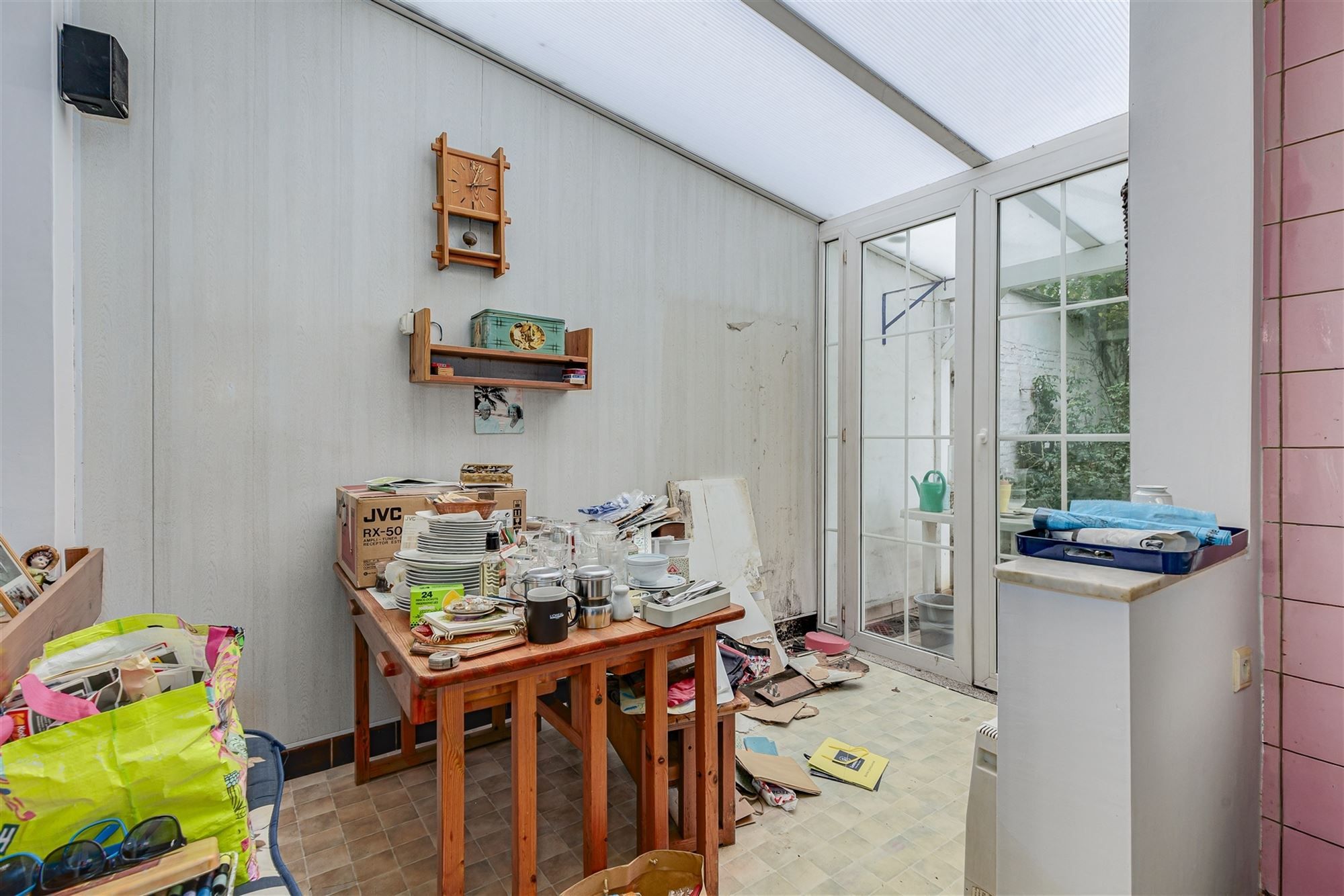 Te renoveren woning met tuin in Merksem foto 7