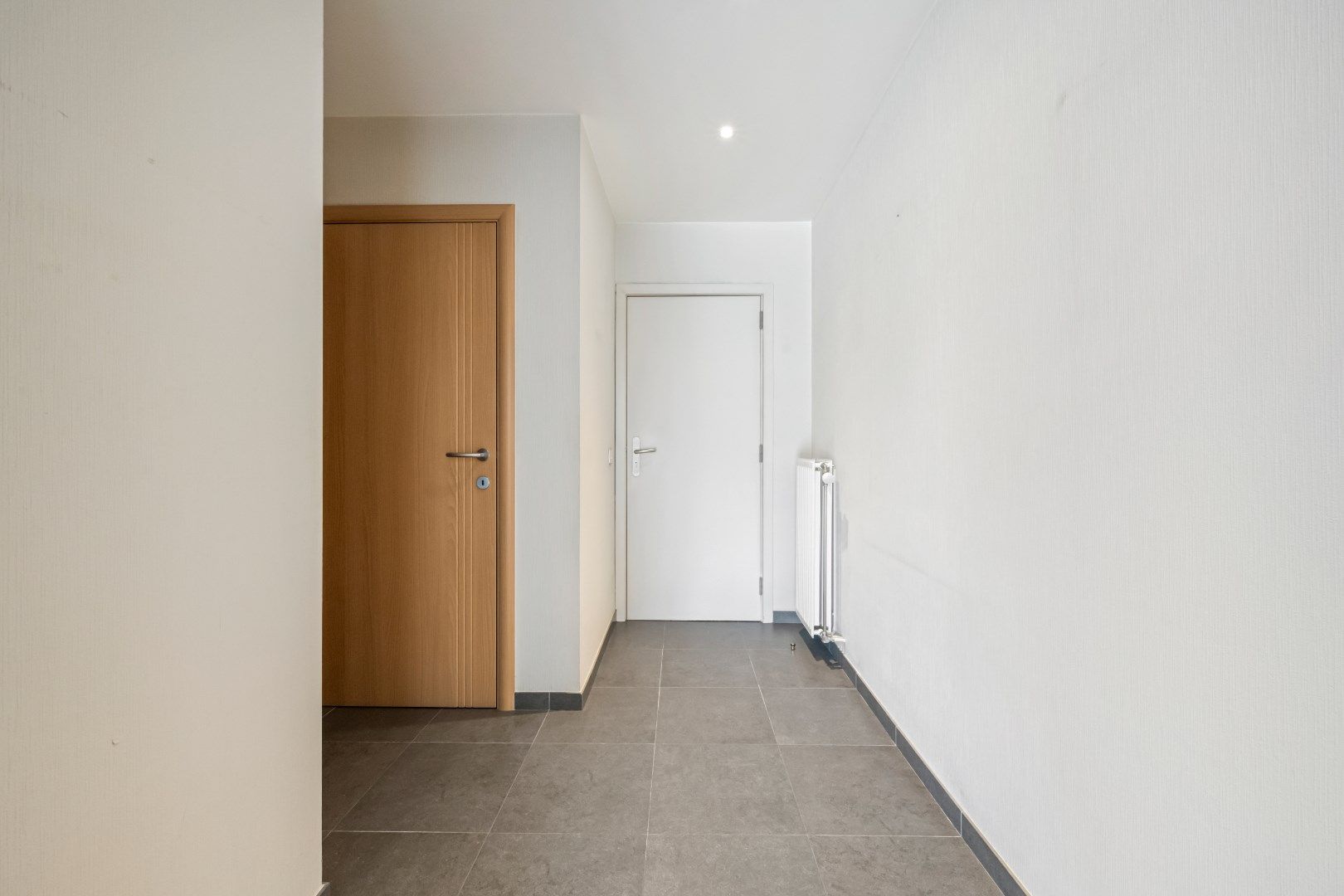 Ruim gelijkvloers appartement met groot terras en garage foto 11