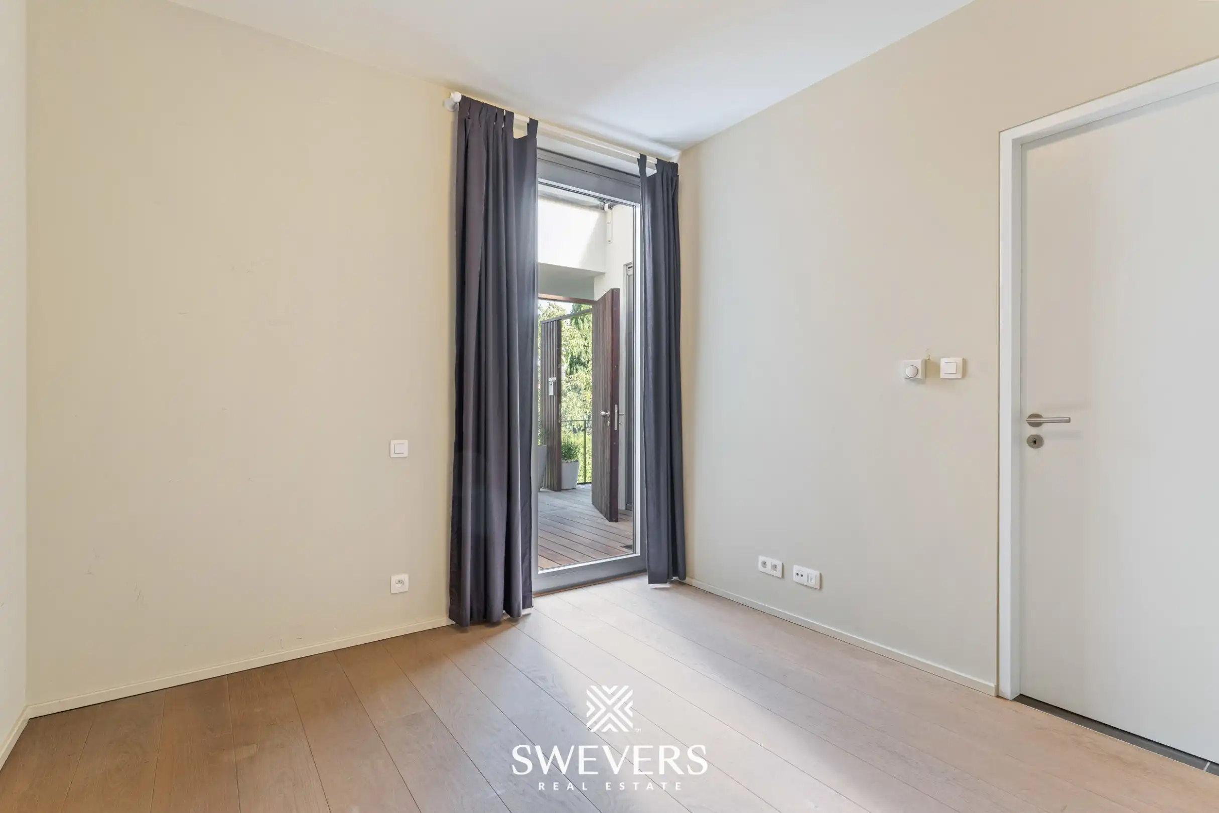 Instapklaar appartement met ruim terras en twee autostaanplaatsen in doodlopende straat foto 14