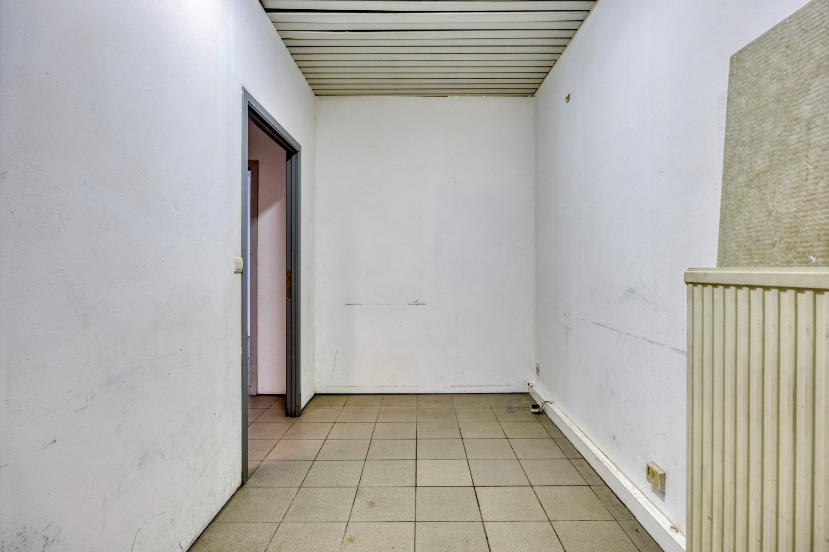 Ruim handelspand te huur in hartje Leuven foto 14