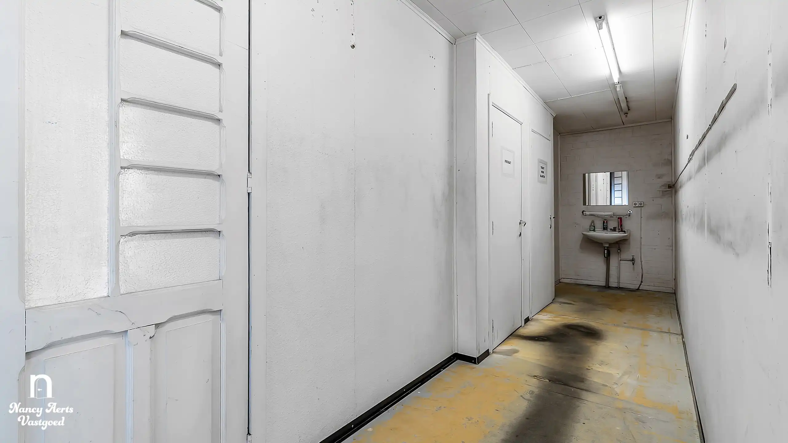 Handelspand van 395 m² in het centrum van Beringen foto 15