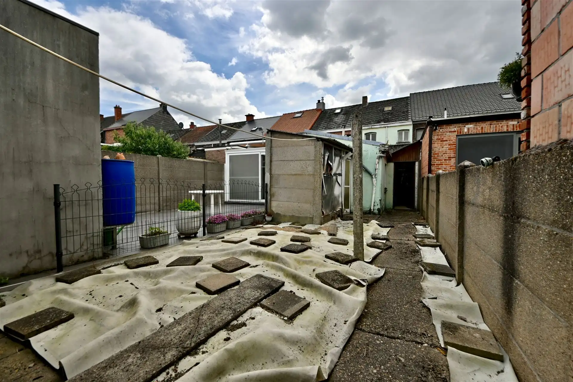 Te renoveren woning met 3 slaapkamers, tuin en garage.  foto 16