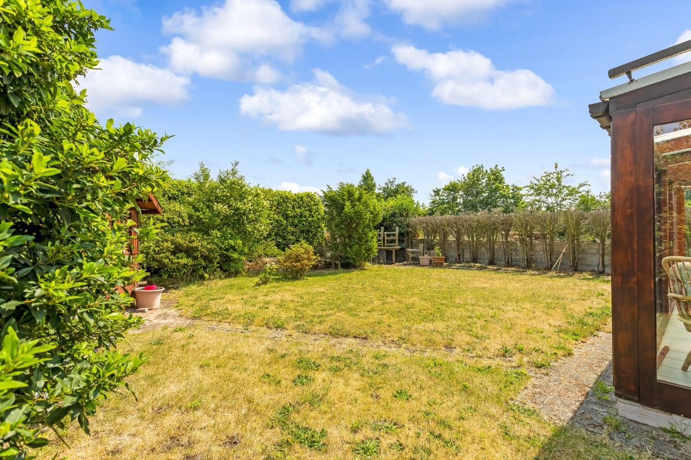 Vrijstaande laagbouwwoning met 3 slpk., inpandige garage en tuin foto 22
