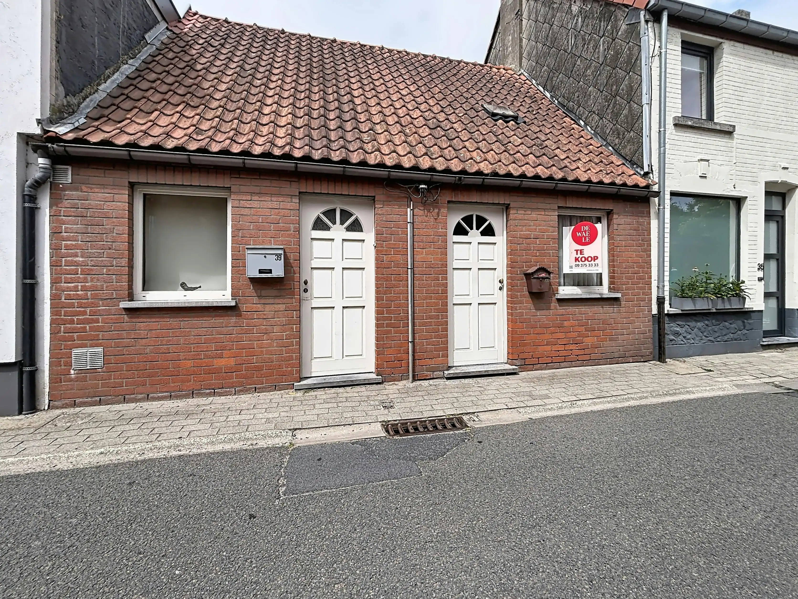 Te renoveren woning met tuin in Deinze foto 2