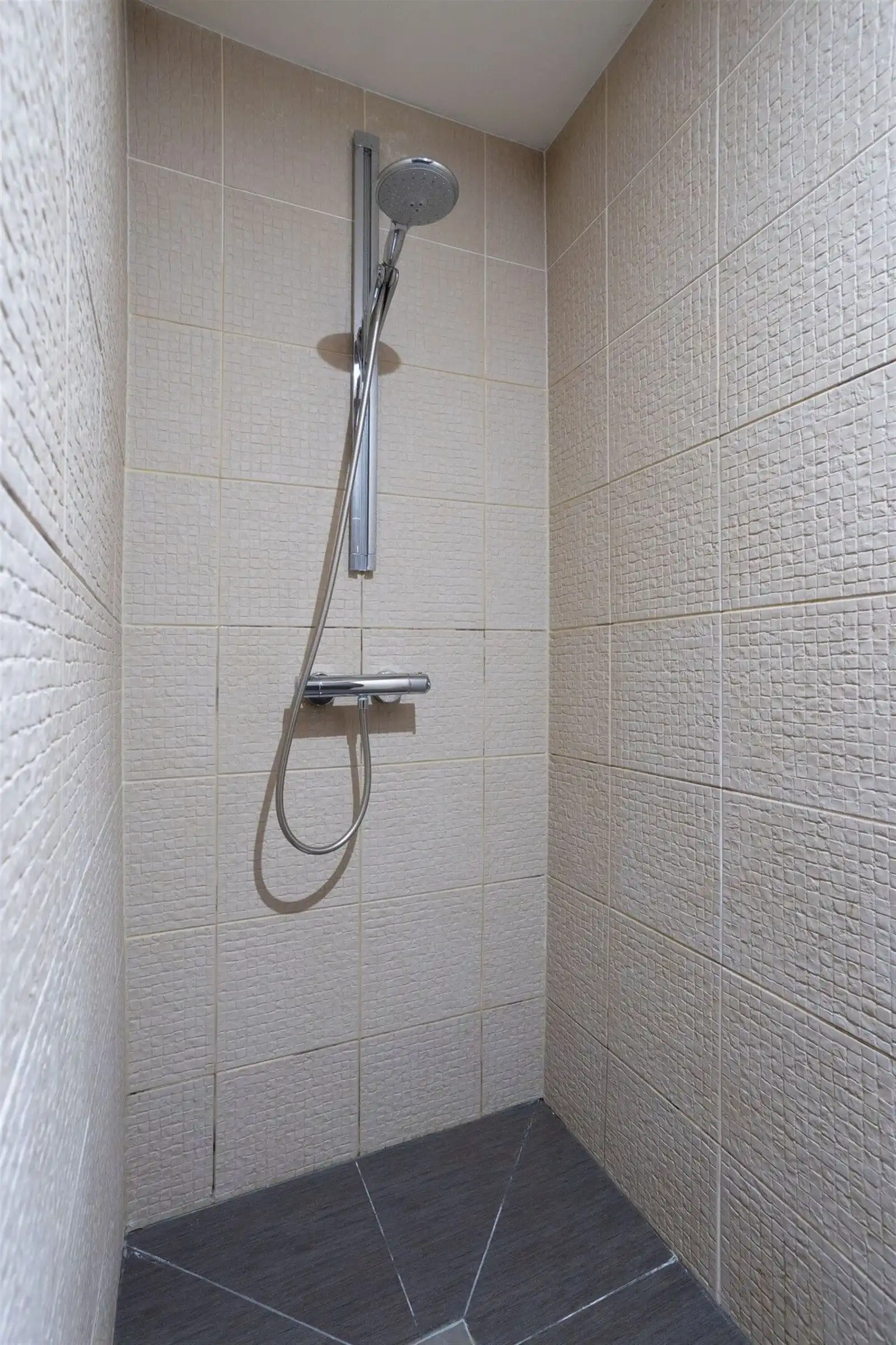 Gelijkvloers appartement met 2 slaapkamers en tuin, kelder & staanplaats foto 18