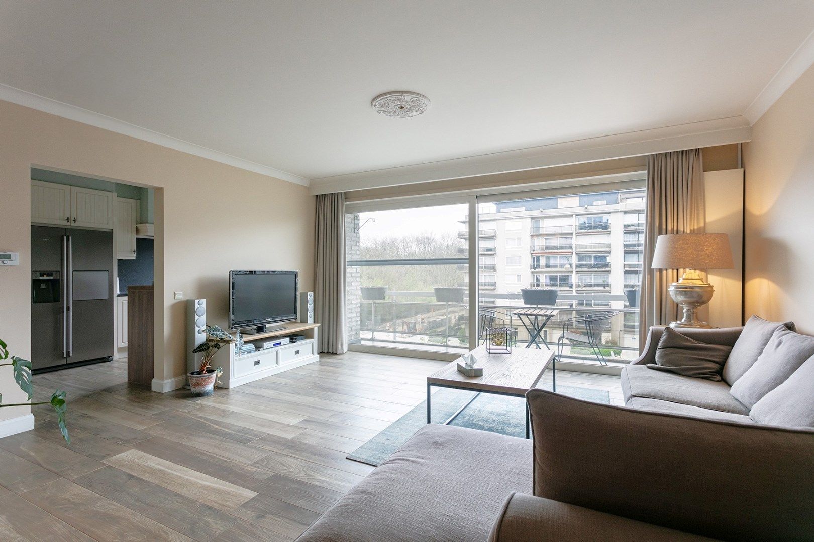 Luxueus en energiezuinig appartement (129m²) met 3 slaapkamers, twee terrassen en een garagebox! foto {{pictureIndex}}