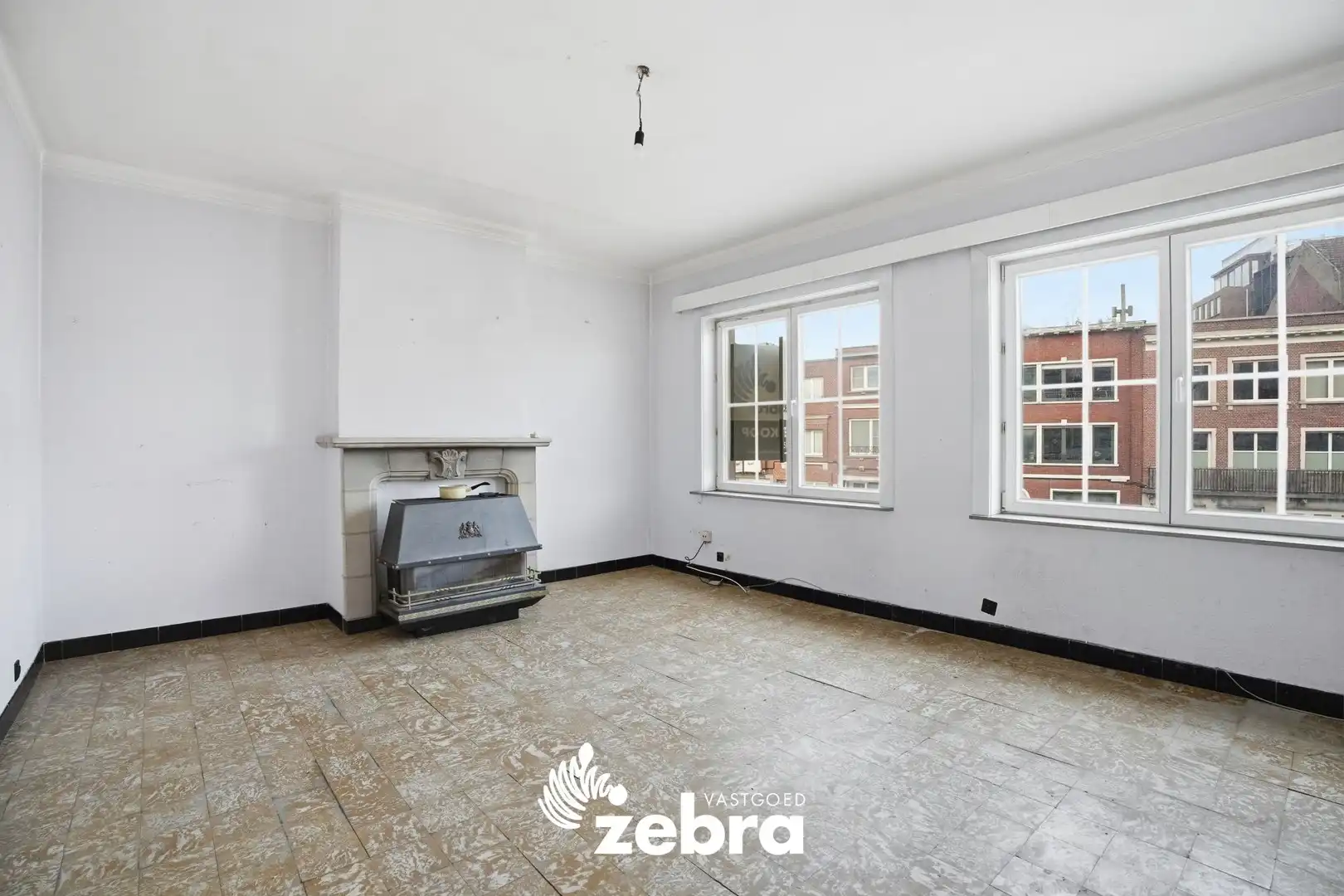 Te renoveren appartement op centrale ligging in Kortrijk! foto 5