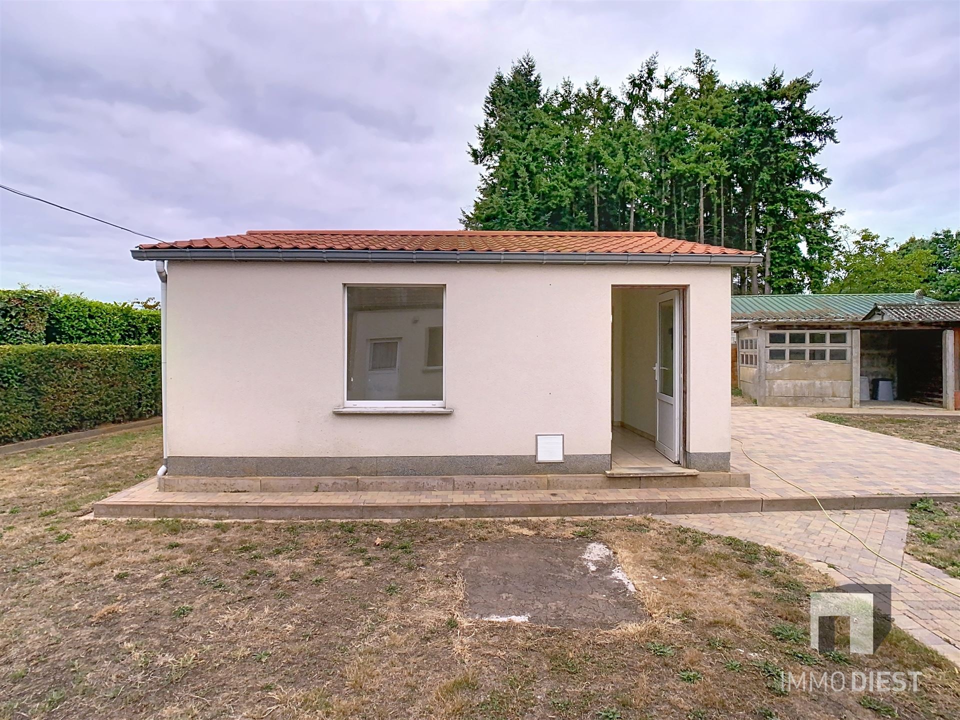 Woning + tuin + bos-en weiland foto 3