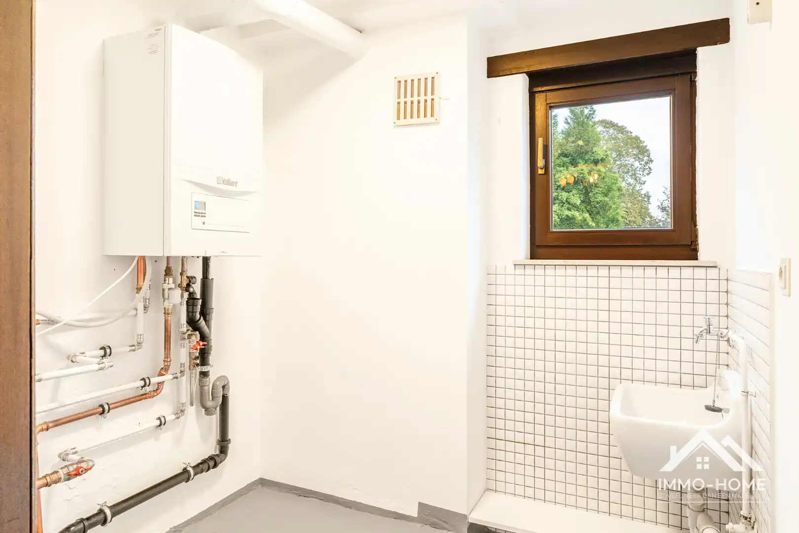 Karaktervol opbrengsteigendom in hartje Lokeren met studio en duplex appartement! foto 22