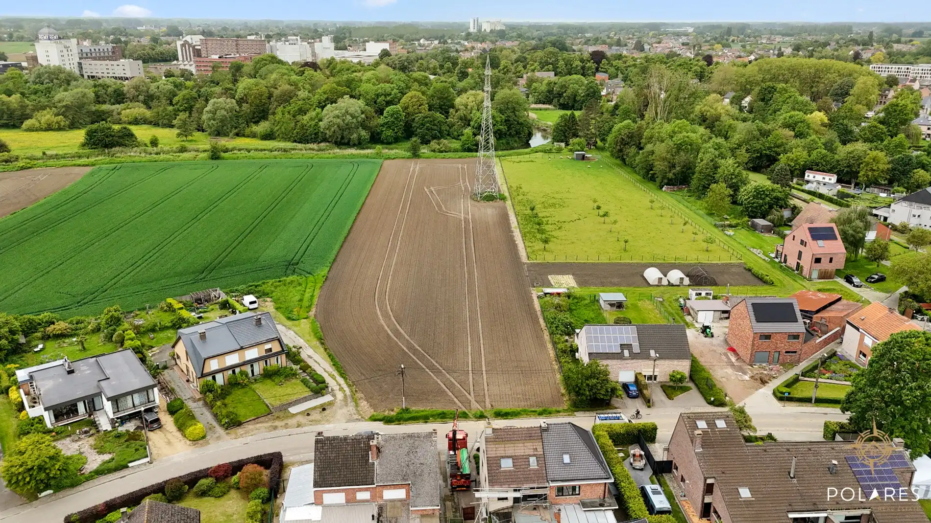 Unieke bouwgrond van 8.879 m² met zicht op de Remy-toren en de Dijle foto {{pictureIndex}}