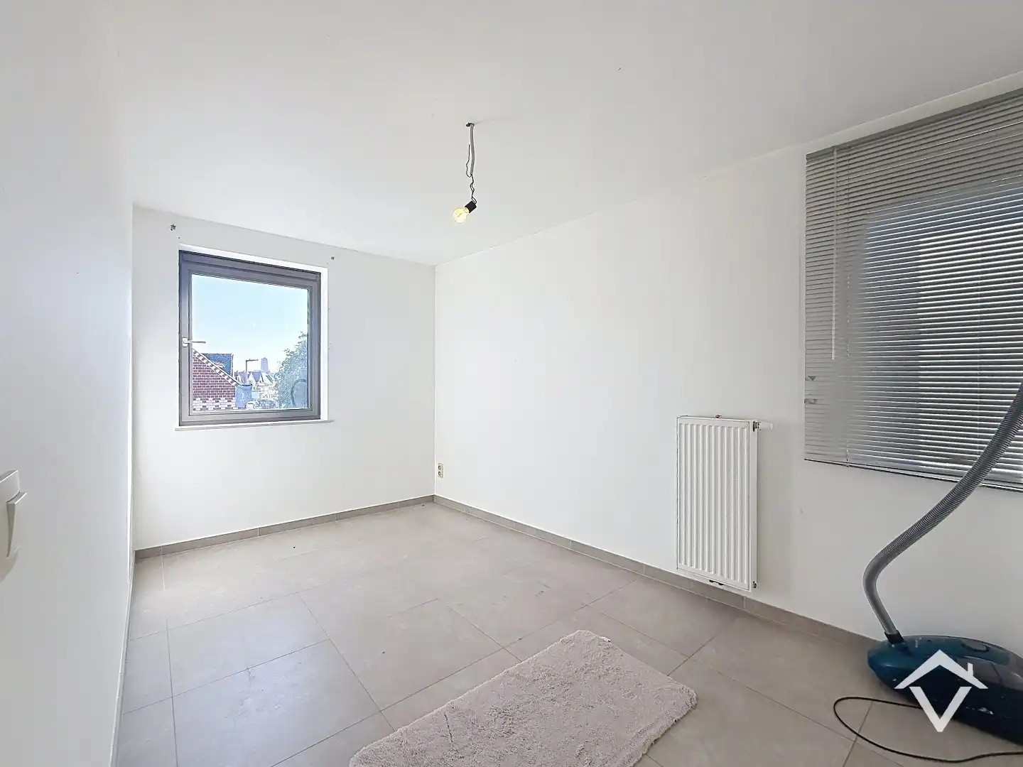 Bel-étagewoning met 2 slaapkamers, zonnig dakterras en ruime garage te centrum Roeselare foto 15