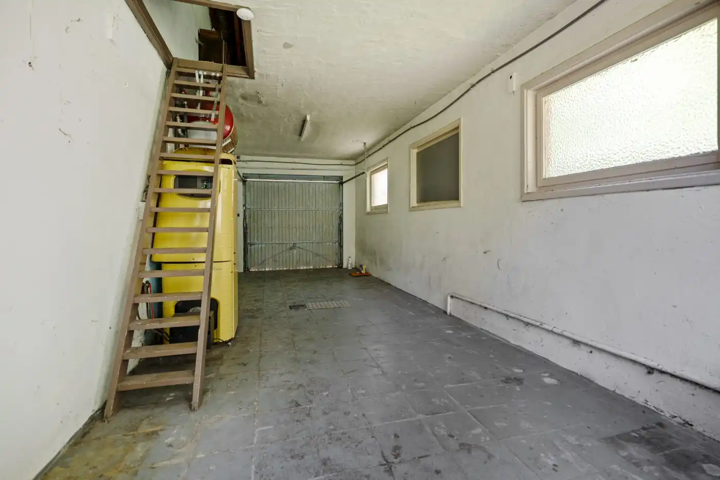 Vrijstaande, te renoveren woning met 3 slpk., garage en tuin foto 26
