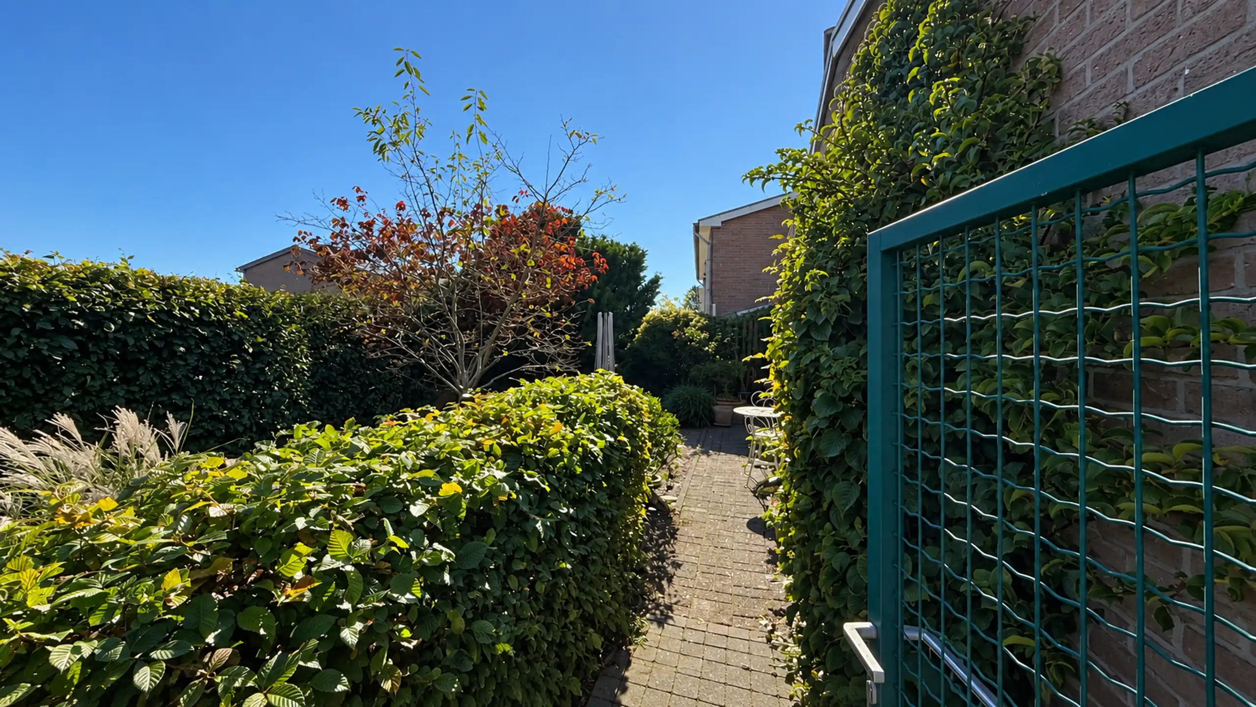 Goed onderhouden woning met 3slpk + garage in Heusden! foto 29