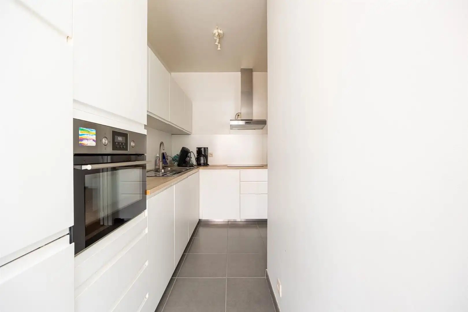 Opbrengsteigendom met 5 appartementen en garages foto 14