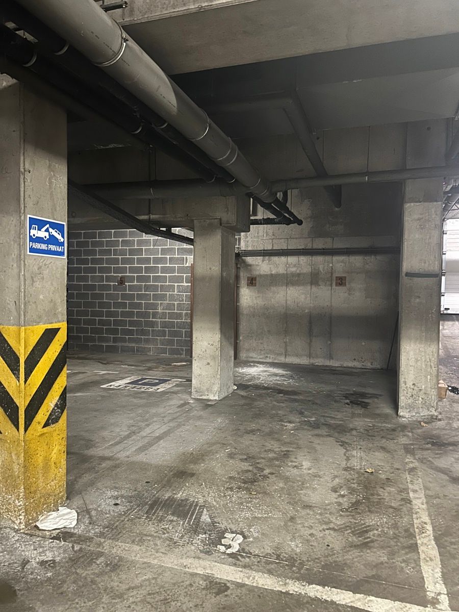 Ondergrondse autostaanplaats Stadskern Leuven foto {{pictureIndex}}