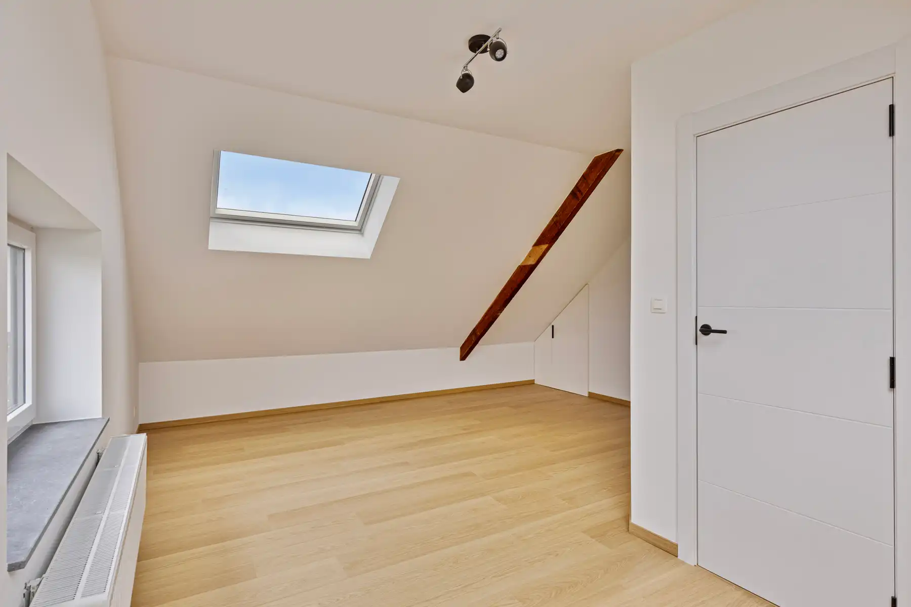 Duplex appartement met 4 slpk en 2 badkamers, tuin en garage foto 15