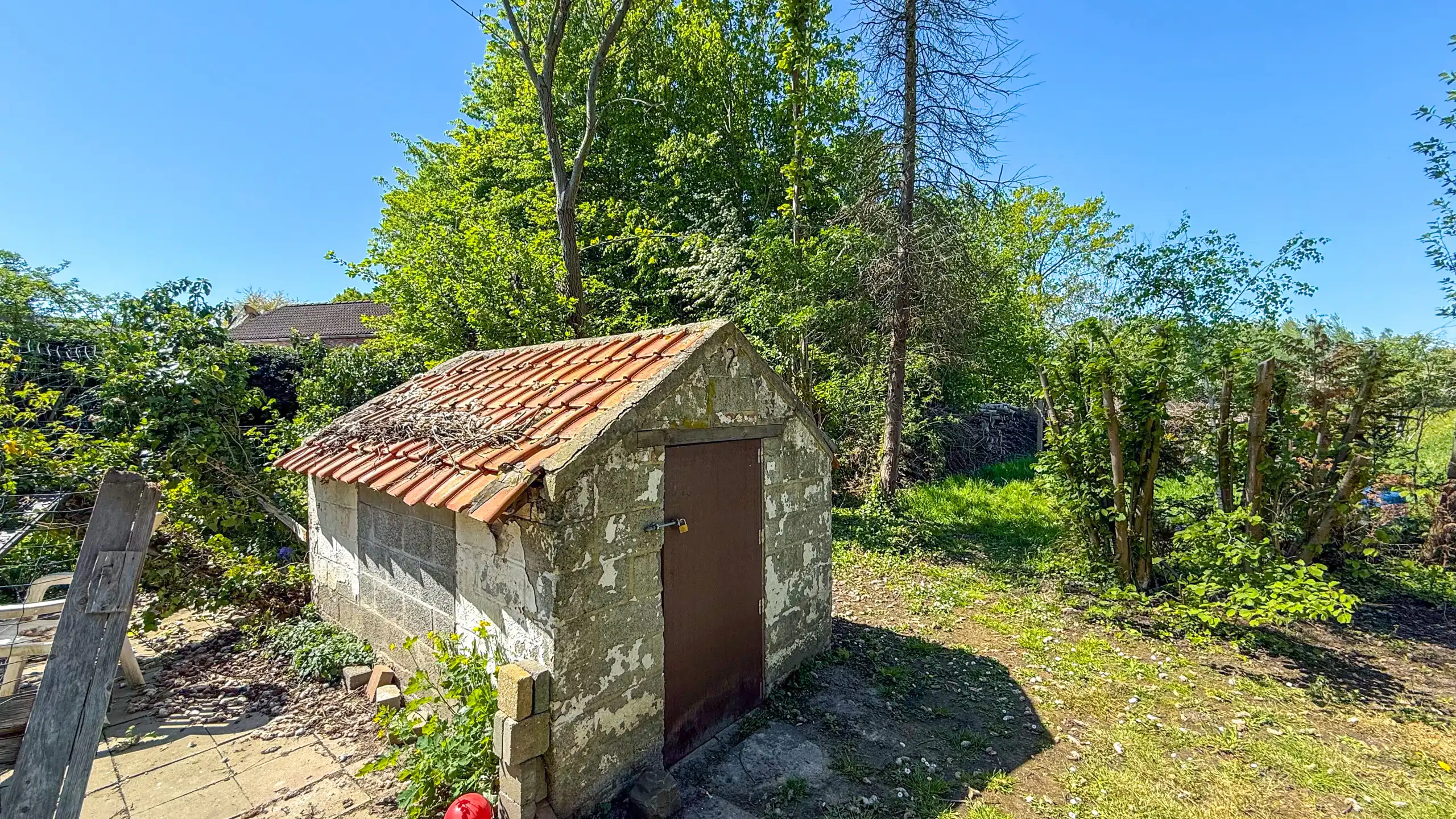 Te renoveren woning met 3 slpkms op ruim perceel van 8a58ca! foto 23
