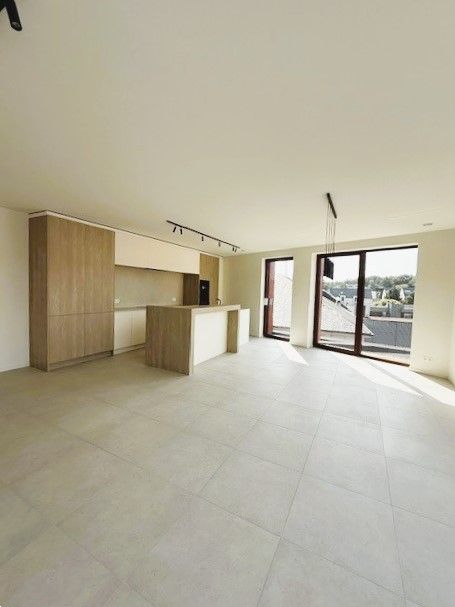 Exclusieve penthouse in residentie Klaver met luxe, ruimte en zon in het hart van Lummen foto 2