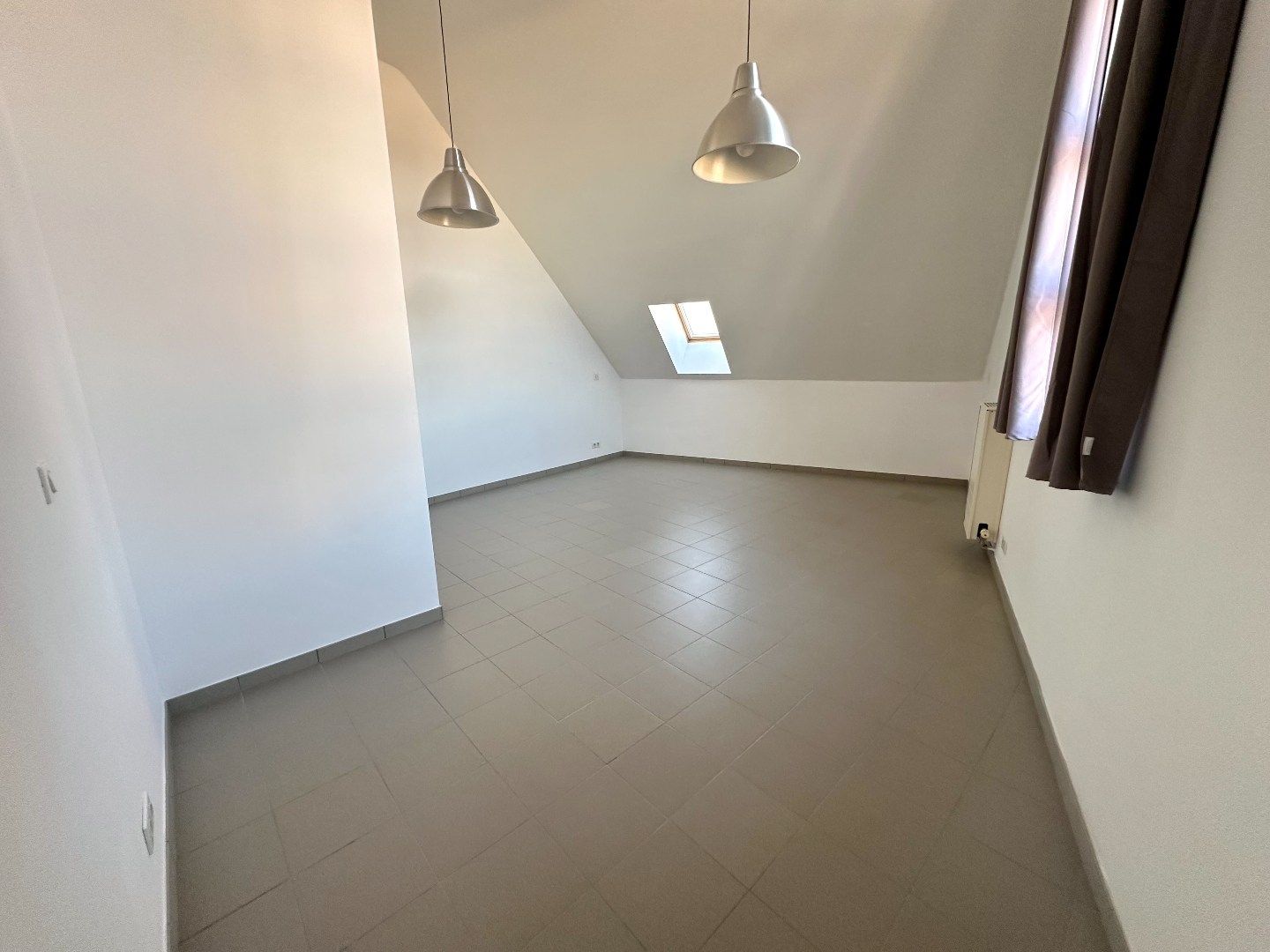 Gezellig duplexappartement op de 2e verdieping, centraal gelegen in het hart van Tongeren. foto 9