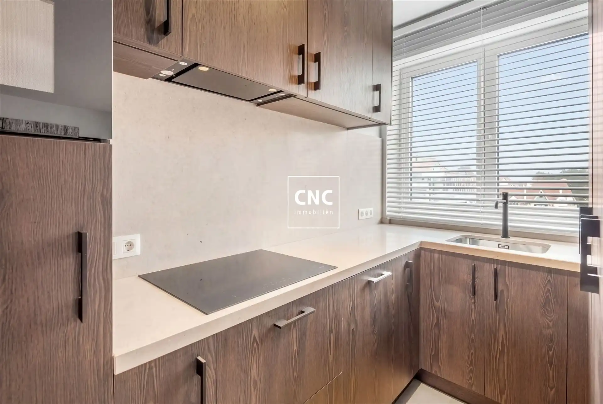 Stijlvol gerenoveerd appartement - open zicht op de villa’s foto 3