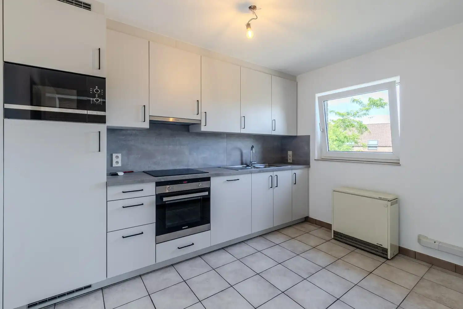 Instapklaar appartement met twee slaapkamers en ruime ondergrondse parking in Smeermaas, Lanaken. foto 13