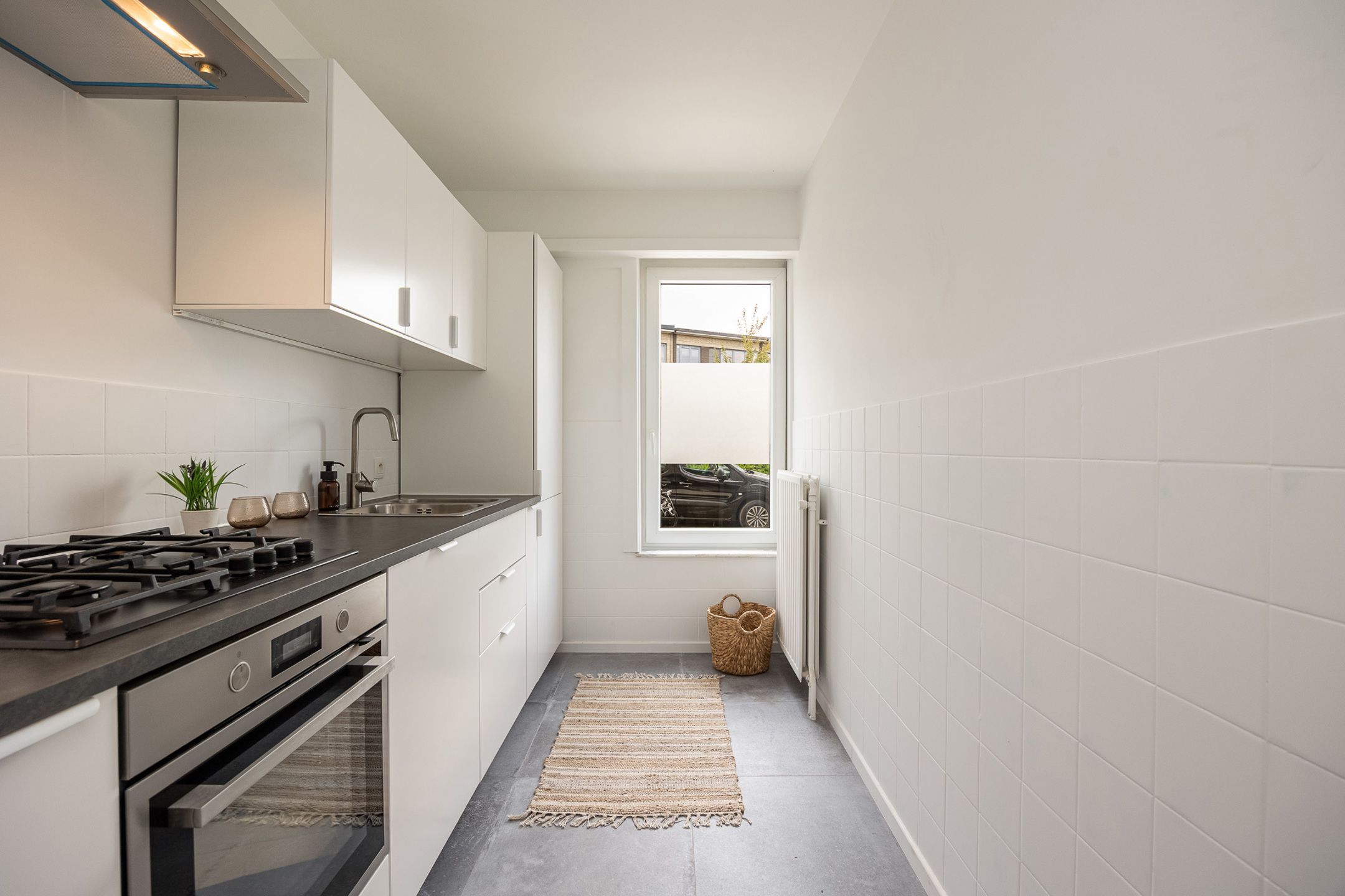 Gerenoveerd gelijkvloers appartement met tuin foto 10