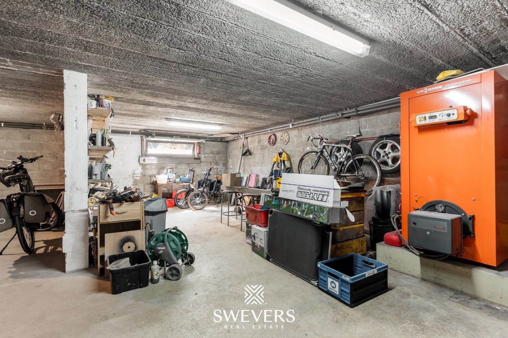 Ruime gezinswoning met zonnepanelen, kelder en zonnige tuin op topligging foto 24