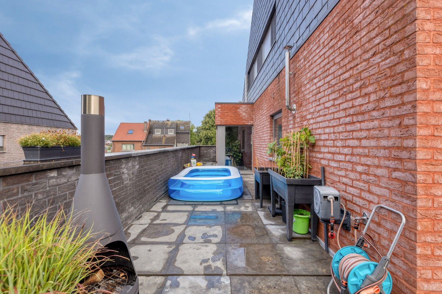Instapklare en lichtrijke duplex met terras, garage én drie slaapkamers foto 28