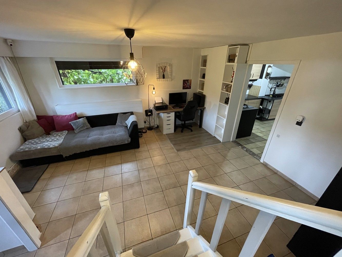 Knusse split-level woning op nagenoeg 27 are grond foto 10