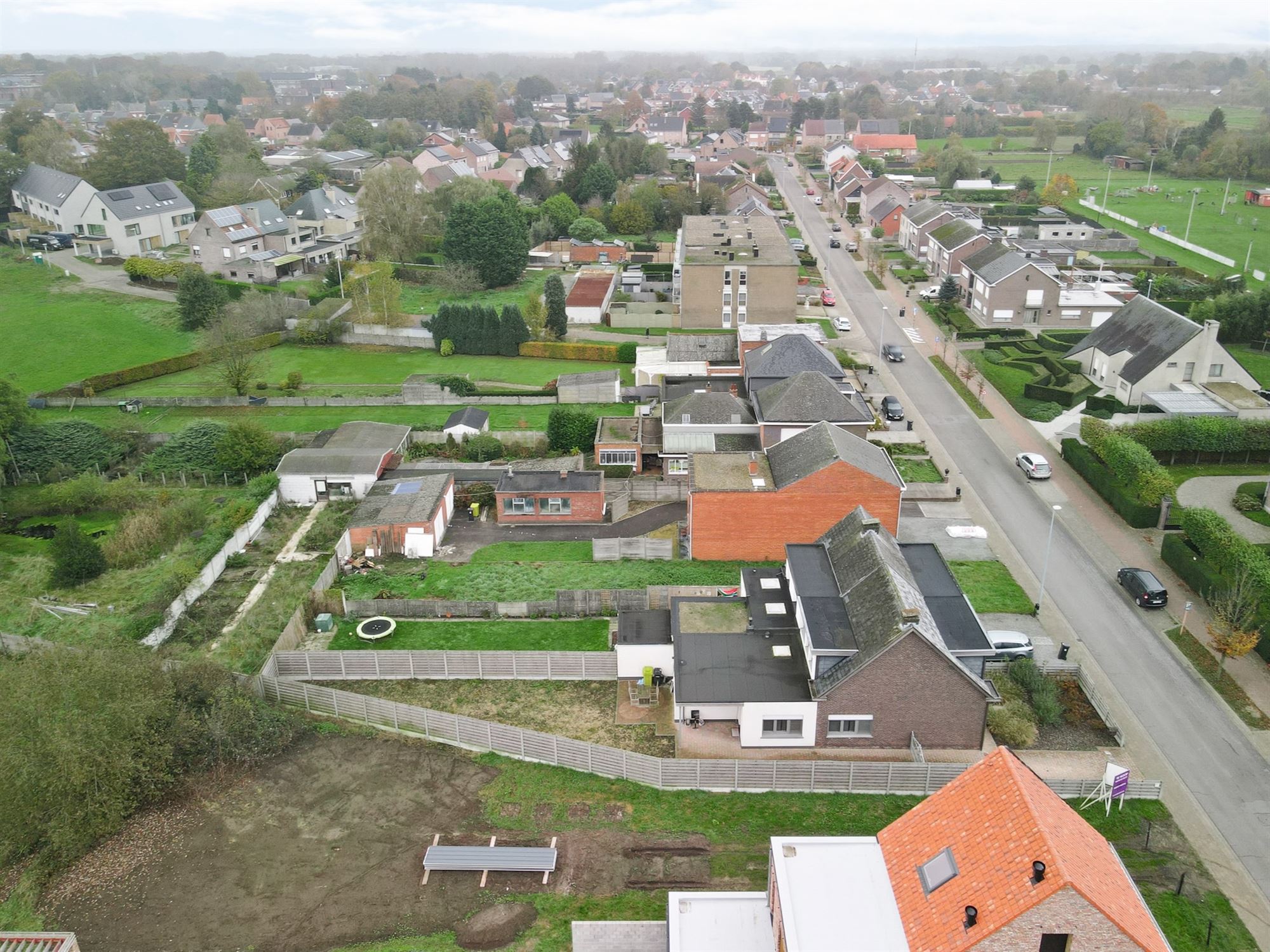 Perceel bouwgrond (650 m2) voor half open bebouwing niet ver van het centrum foto 14