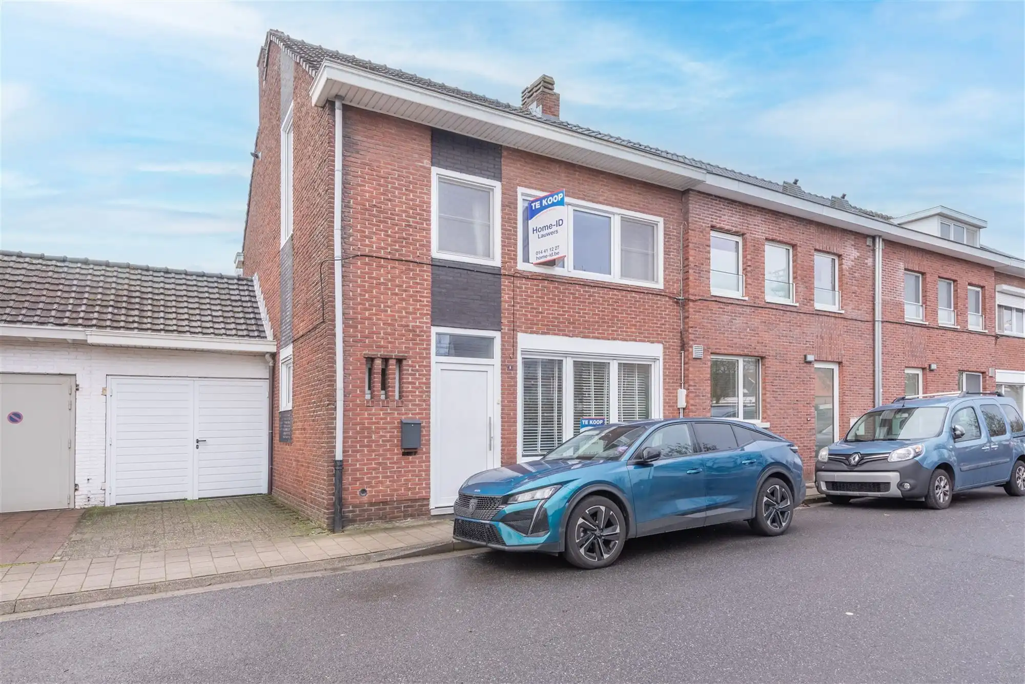 Hoofdfoto van de publicatie: woning met 4 à 5 slaapkamers, leuke tuin en garage met oprit